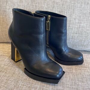 Black Ankle Boots with Gold Accents